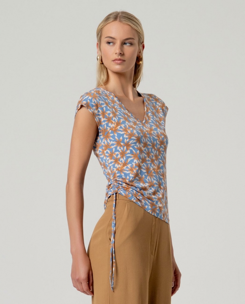 Camiseta sin mangas escote pico azul empolvado